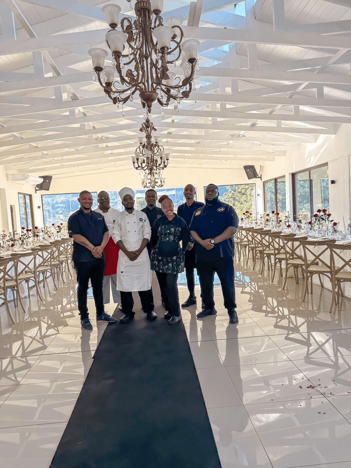 The Biggy Smallz Spitmasters team at Moyres Venue, in kitchen and front-of-house uniform.